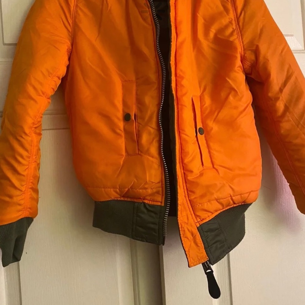Only wear one time nice bomber jacket reversible militar green and orange